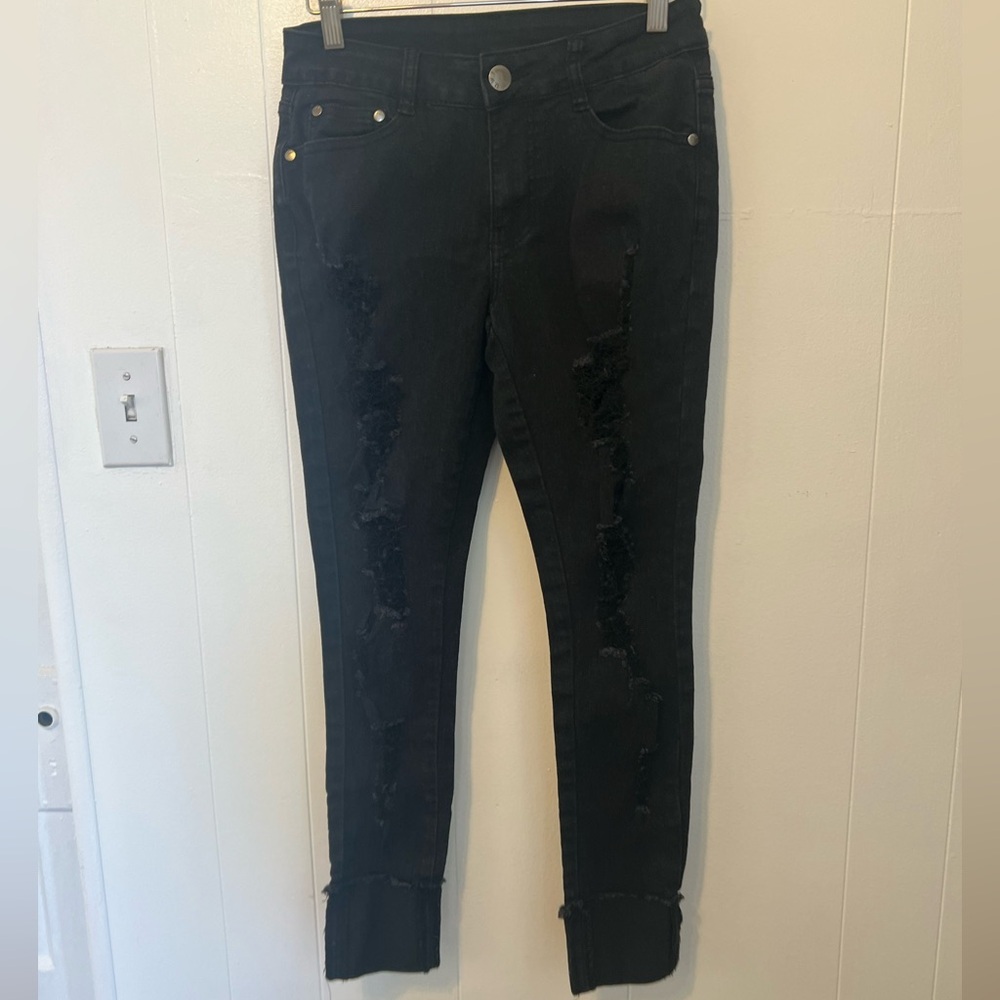 Black distressed black jeans